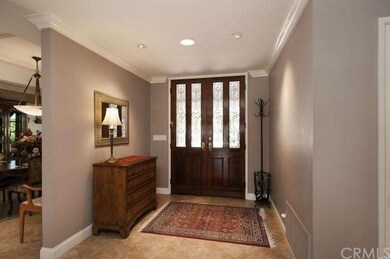 Custom leaded glass double door entry into foyer, 