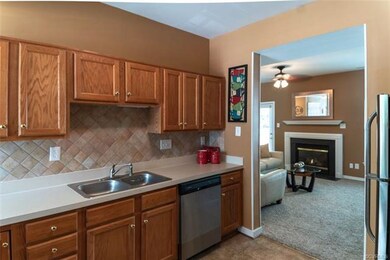 Tiled backsplash, smooth surface counters & new st