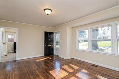 Living Room with fresh paint, new light fixtures a