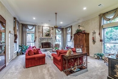 Spacious living room with a stone full masonry fir