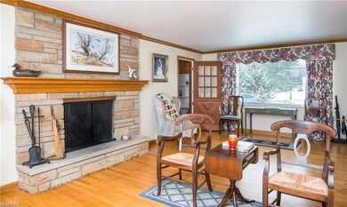 Another view of the living room, including working