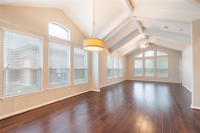 Unfurnished living room with ceiling fan, healthy