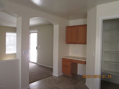 pantry and archway to family room