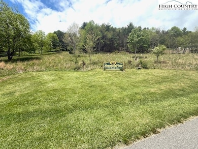 HOA sign currently sits on lot. Property extends b