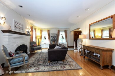 The generous Living Room features a wood-burning f