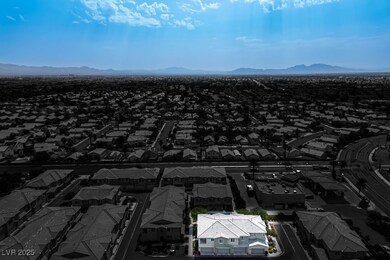 Aerial view of residential area featuring mountain