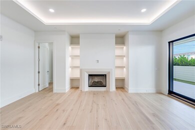 Indoor electric fireplace with elegant stone surro