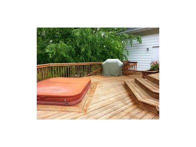 Hot Tub. Natural gas grill to the rear and a priva