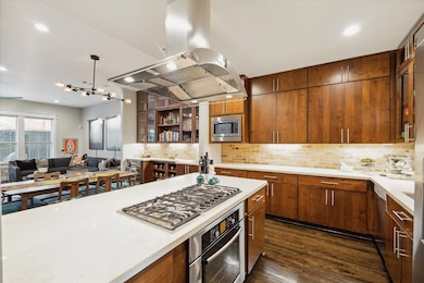 Thoughtfully designed kitchen with rich wood cabin