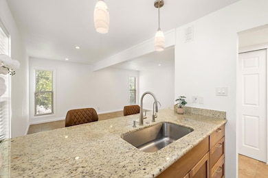 Kitchen with light tile patterned floors, plenty 