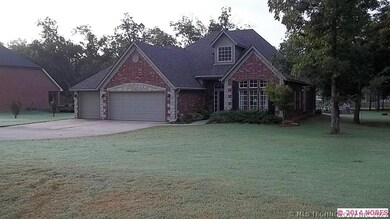 3 car attached garage with extended driveway and p