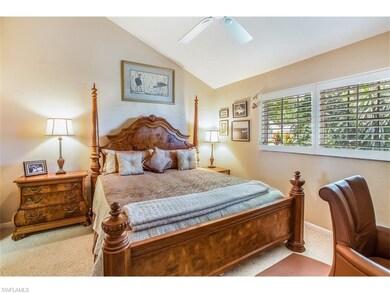 The spacious master bedroom also features vaulted 