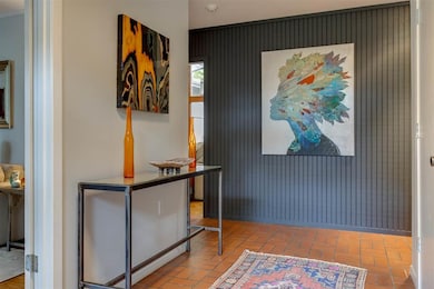 Entry leads to living room, dining room and vaulte