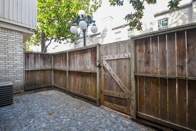 Private front patio, fully fenced.