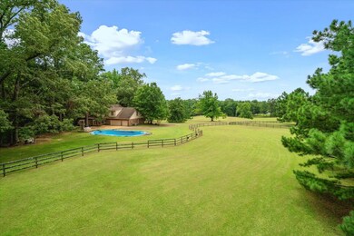 View of yard with a rural view