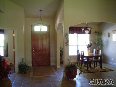 The elegant entry leads to a open Living - Dining 