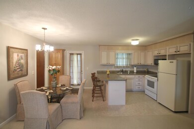 Open kitchen with dining room.