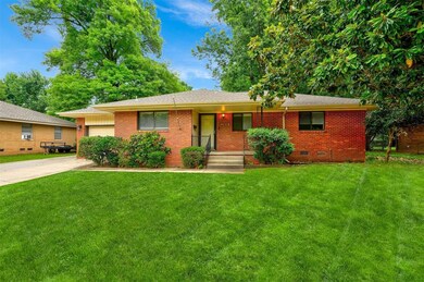 Single story home featuring a front yard