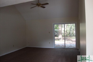 Spacious Living Room with sliding glass doors tran