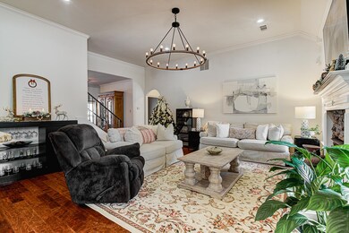 Living room with dark wood-type flooring, a notabl