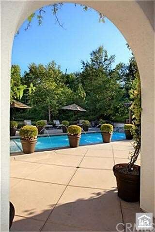View of pool from Family room arches