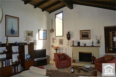 Santa Barbara Style Living Room with Vaulted Ceili
