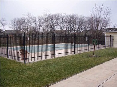 community pool right next door! All the perks of a