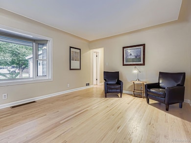 The original hardwood floors have been beautifully refinished throughout the home.