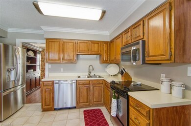Kitchen with S/S appliances. Tile floors