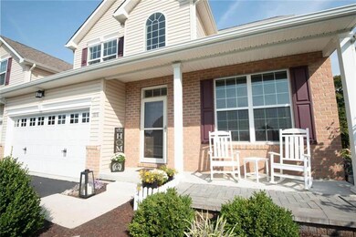 Cozy covered front porch so inviting to enjoy the 