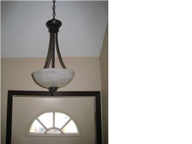 Nice updated light fixtures throughout home.