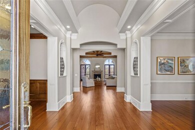 View from front door through barrel-ceiling foyer 