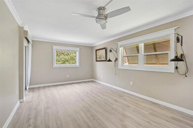 Liv Room/Dining Room combination. Notice all new windows and sliders installed.