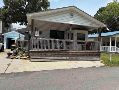 View of front of home featuring covered porch