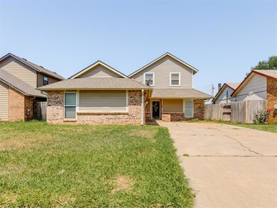 View of front of property featuring a front lawn
