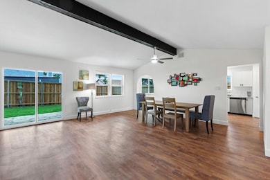 Dining space featuring dark wood finished floors,
