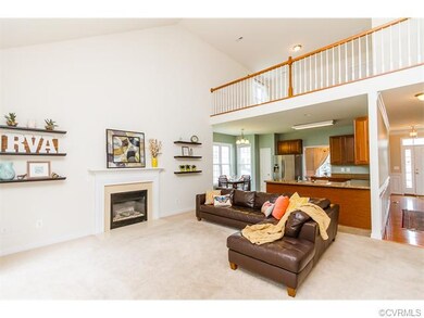 Enjoy the vaulted great room with gas logs/firepla