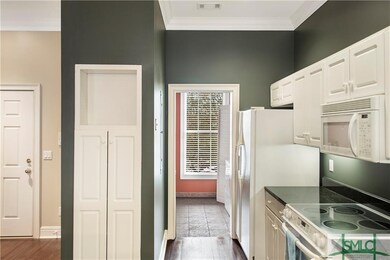 View into Laundry Room with pocket door.