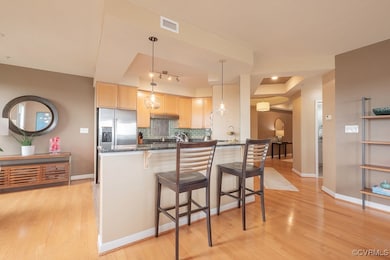 Kitchen featuring stainless steel refrigerator wit