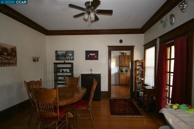 As seen from the LR; kitchen thru far door. Home e