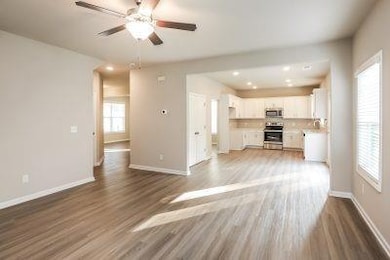 Unfurnished living room with a healthy amount of s