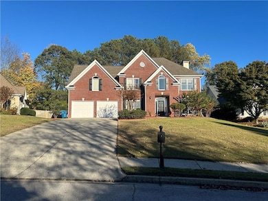 View of front of property featuring brick siding, 