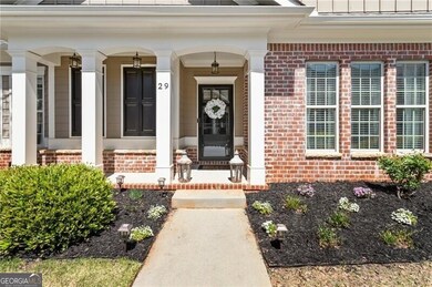 Welcoming entry with covered porch