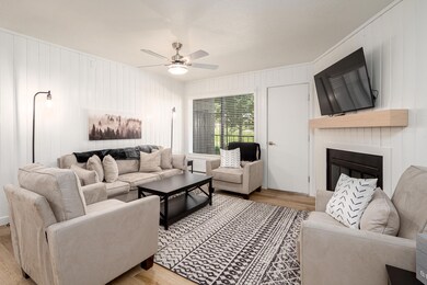 (1) Family room. Woodburning Fireplace.