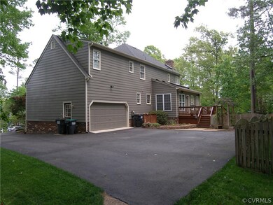 Two Car Rear Entry Garage, Paved Drive, Rear Deck,