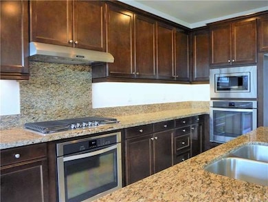 Kitchen space pairs contemporary appliance package