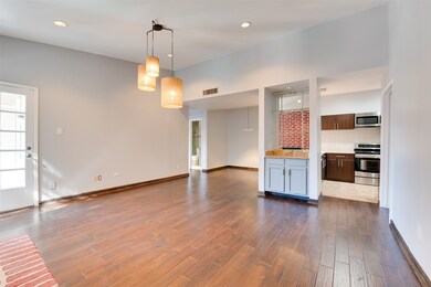 A view from the front door showing the wet bar and