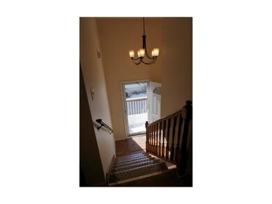 entrance, new carpet, new paint, new light fixture
