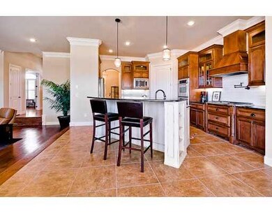 Kitchen. Double ovens, gas cooktop, pot filler, custom cabinets, subway tile, large pantry.