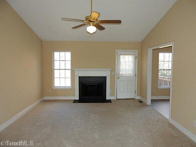 Living Room. Vaulted Ceiling and Fireplace